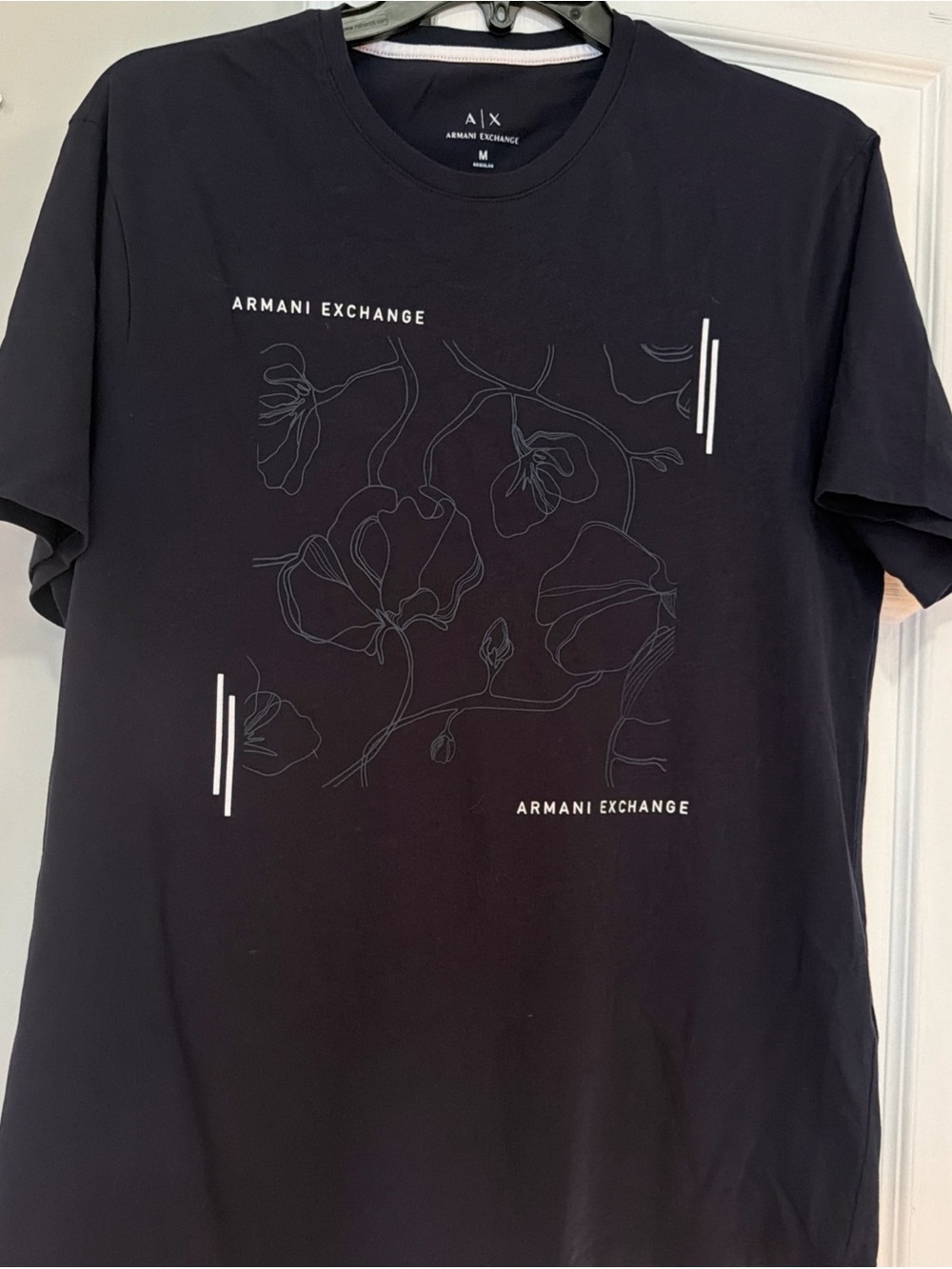 Armani Exchange Black Tee with Subtle Floral Line Art